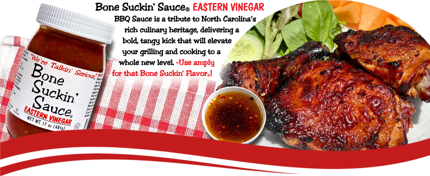 Bottle of Bone Suckin' Sauce with a plate of grilled chicken and salad on a checkered tablecloth. - Bone Suckin' Sauce Eastern Vinegar BBQ Sauce is a tribute to North Carolina's rich culinary heritage, delivering a bold, tangy kick that will elevate your grilling and cooking to a whole new level. Use amply for that Bone Suckin' Flavor!
