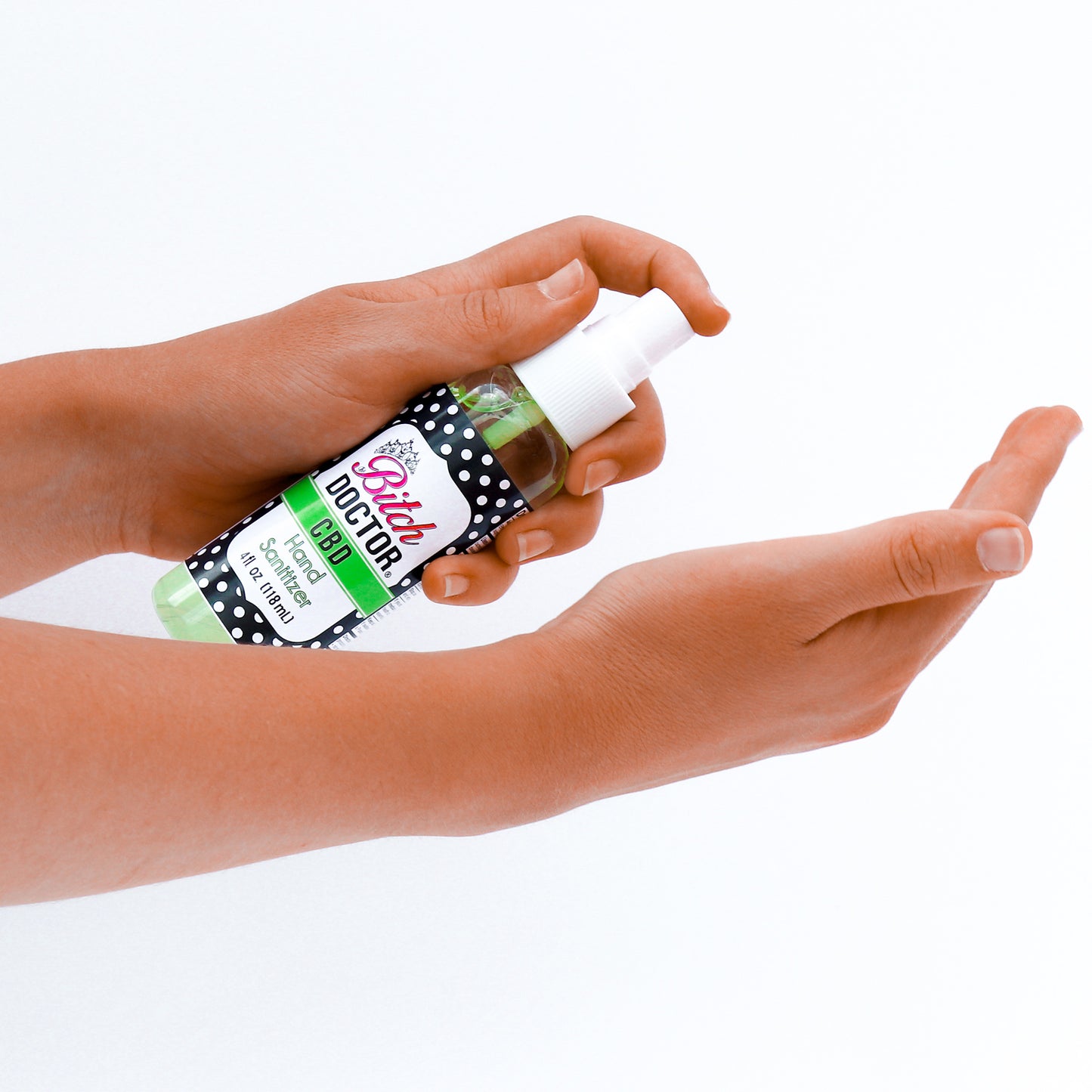 The Bitch Doctor Hand Sanitizer Spray. Spraying into Palms