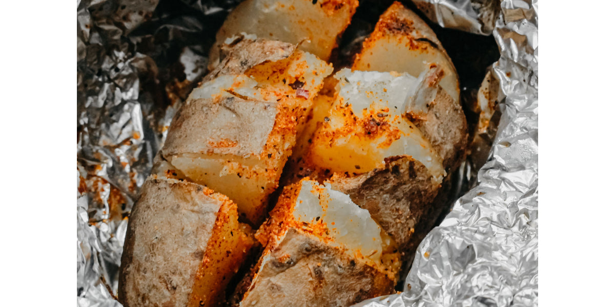 Bone Suckin'® Steak Seasoning on baked potato