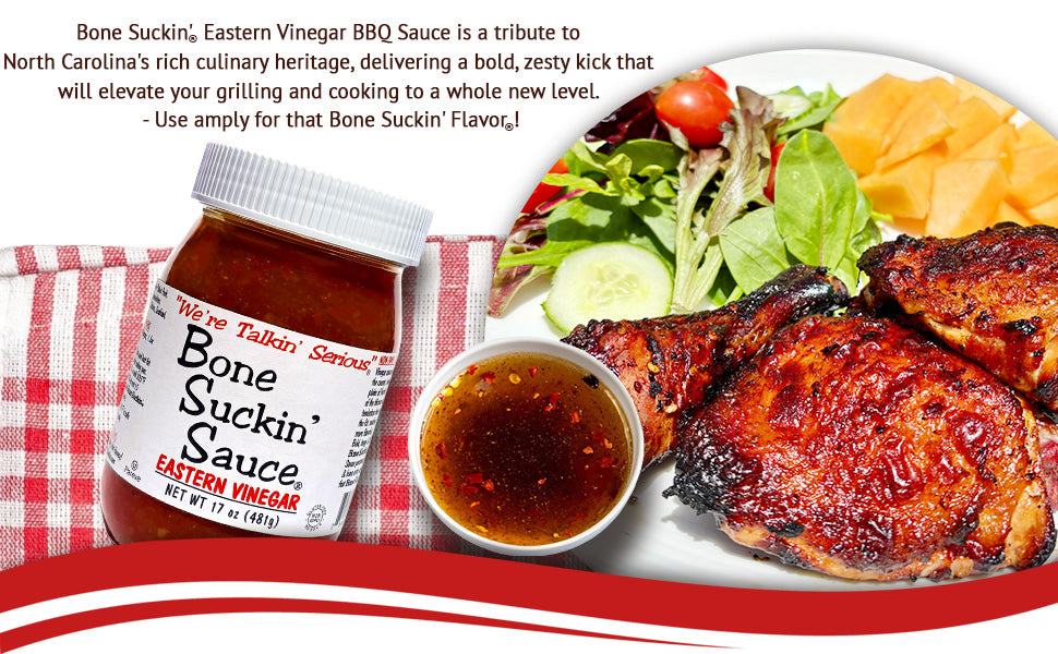 Bone Suckin' Eastern Vinegar BBQ Sauce with grilled chicken and salad on a platter.
