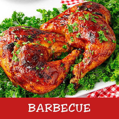 Barbecued chicken on a bed of greens with a red label at the bottom that says "Barbecue"