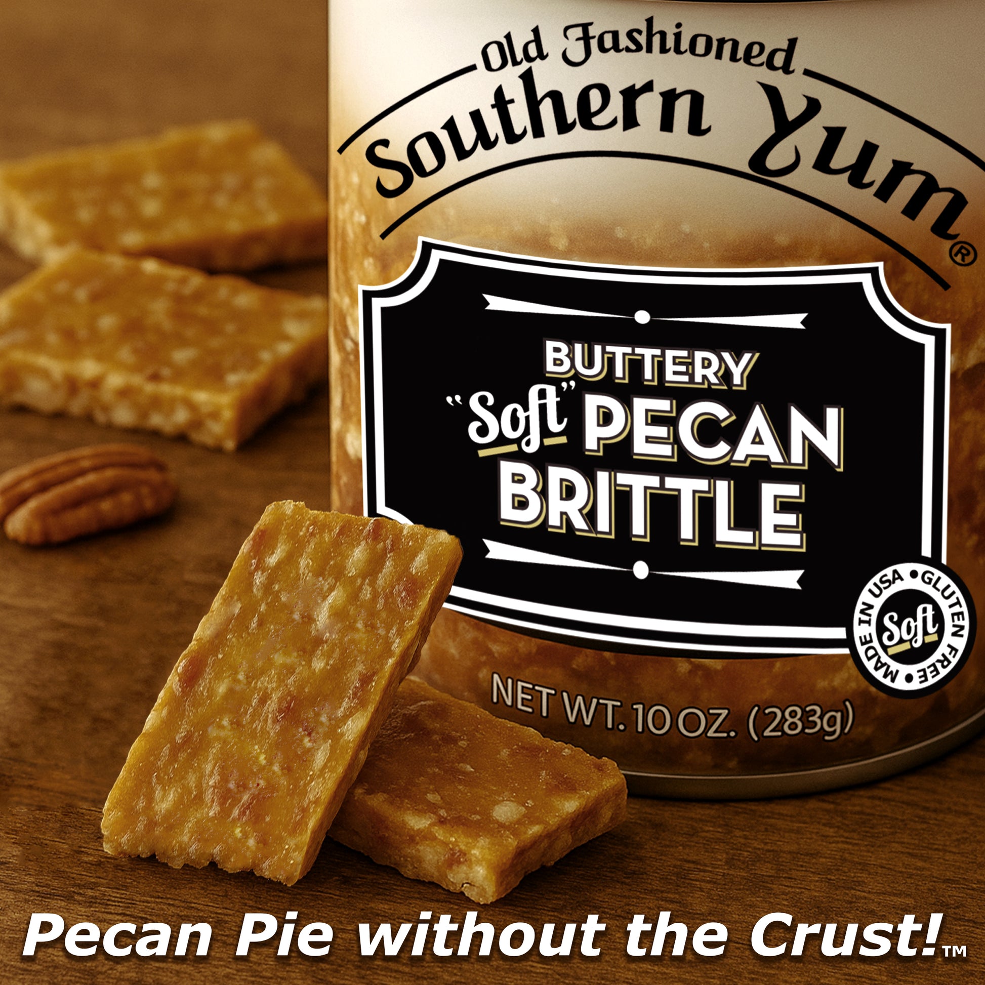 Tin of Old Fashioned Southern Yum Buttery Soft Pecan Brittle on a wooden surface with brittle pieces.