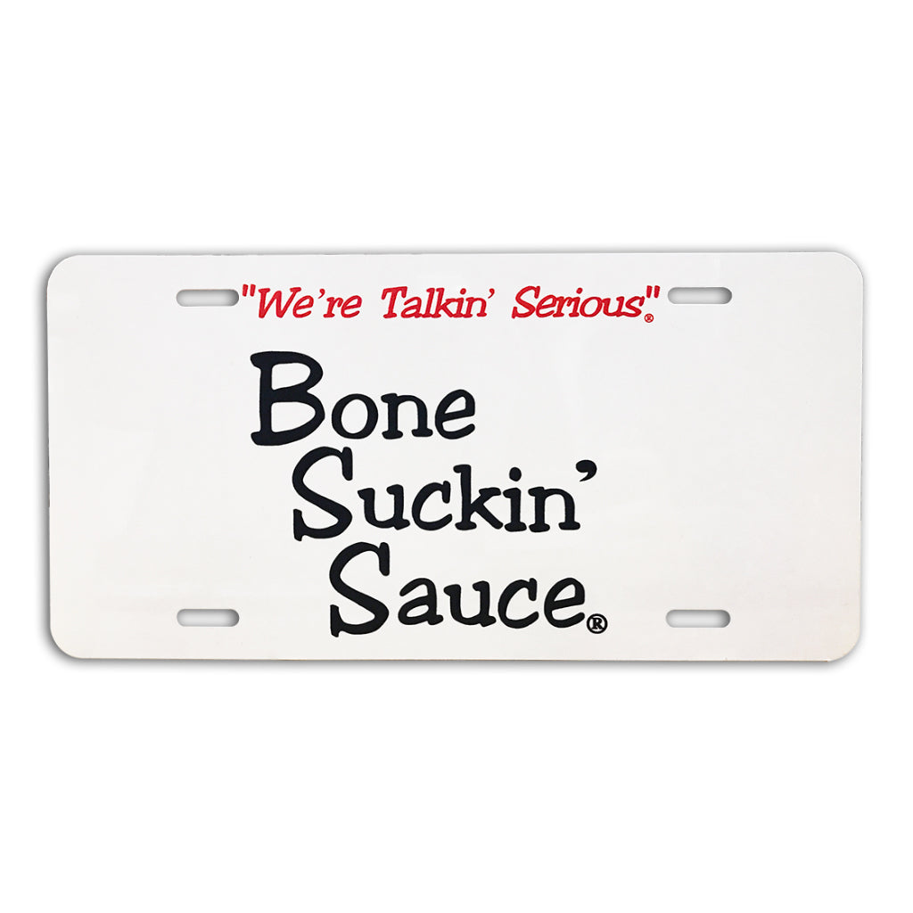 Bone Suckin' Sauce® license plate, white.  Take your favorite sauce with you!