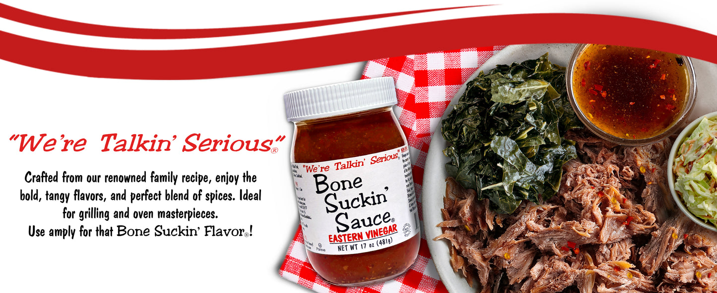 Bone Suckin' Sauce jar with pulled pork and sides on a checkered tablecloth - Crafted from our renowned family recipe, enjoy the bold, tangy flavors, and perfect blend of spices. Ideal for grilling and oven masterpieces. Use amply for that Bone Suckin' Flavor!