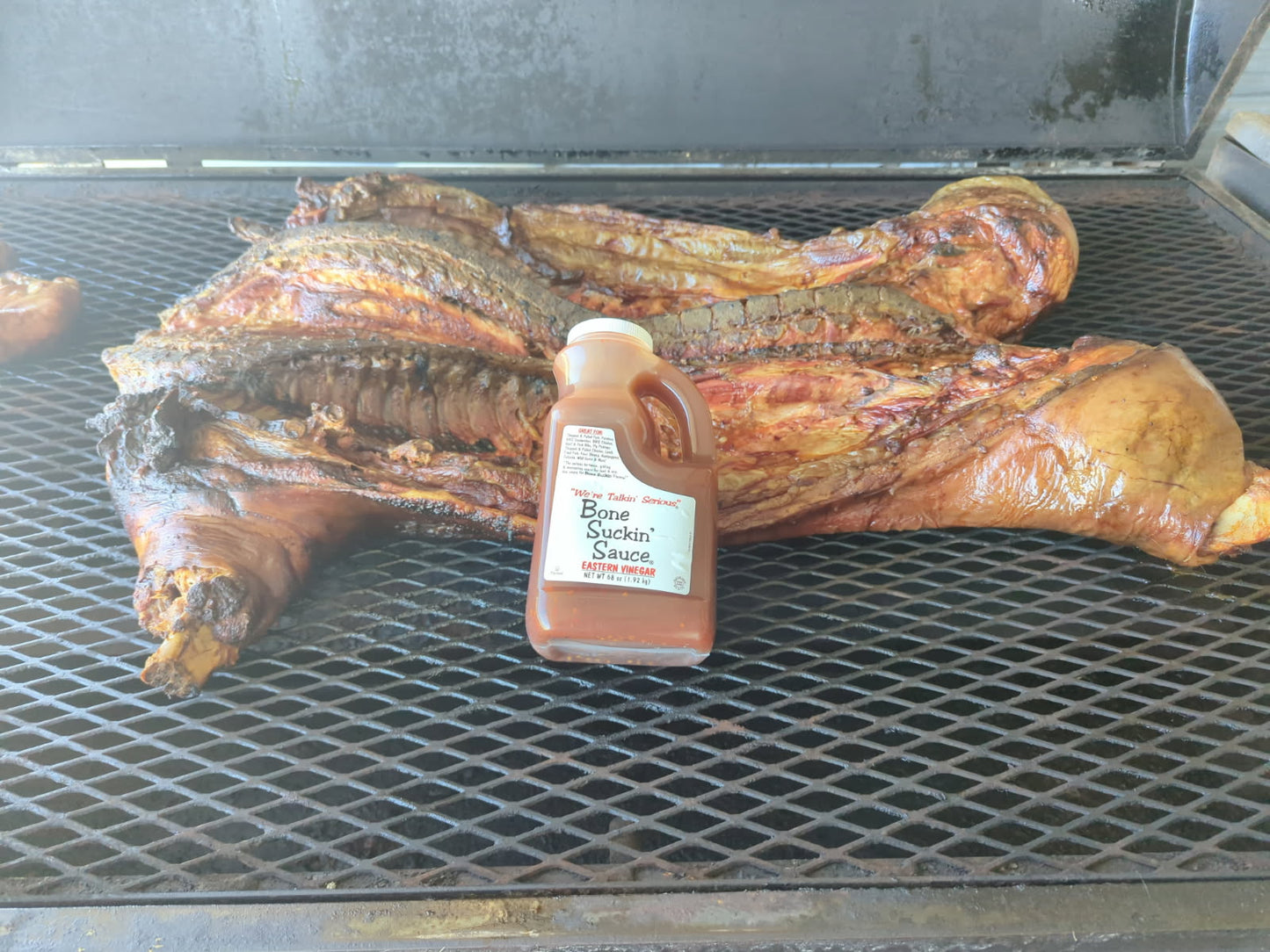 Cooked whole hog with Bone Suckin' Eastern Vinegar Sauce